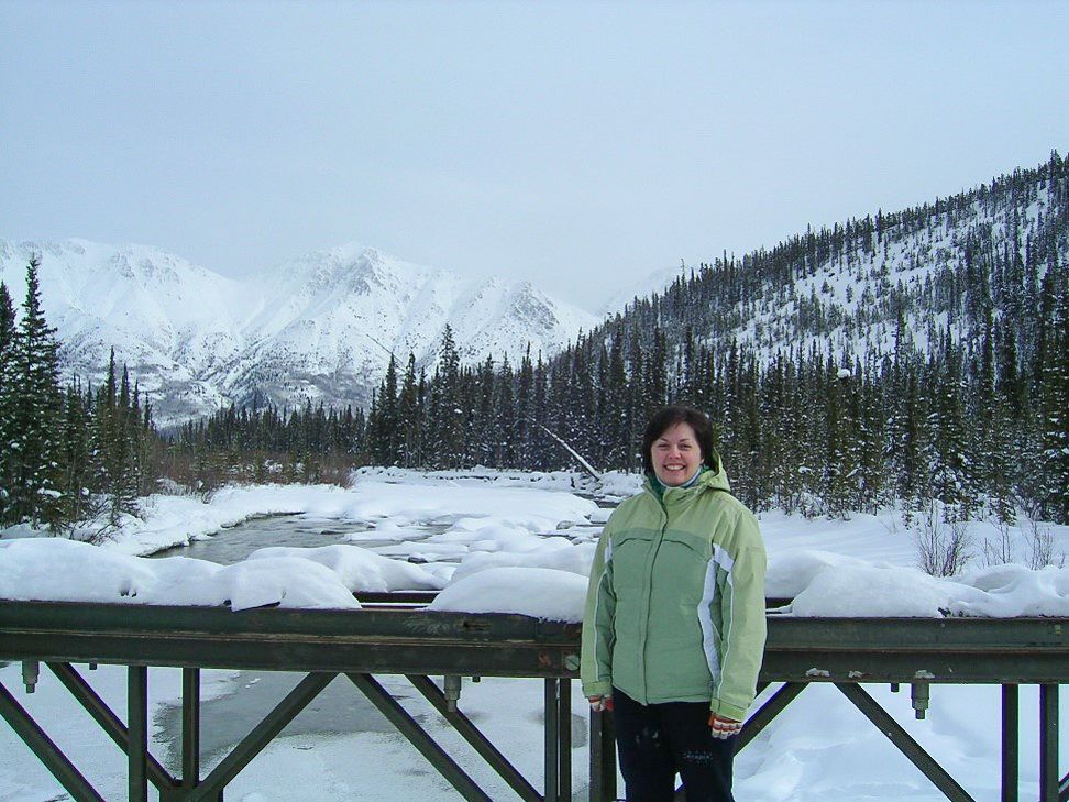A picture shows a person enjoying Yukon scenery
