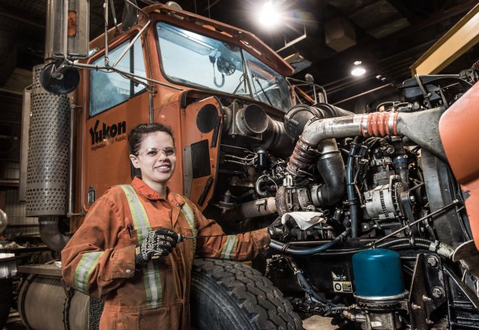 Heavy Equipment mechanic getting repairs done.