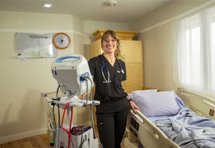 a person standing by an emergency medical equipment.