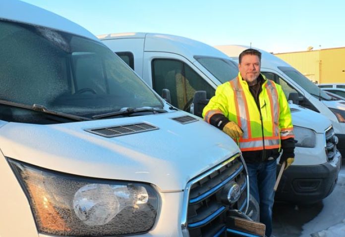 a person standing by a van