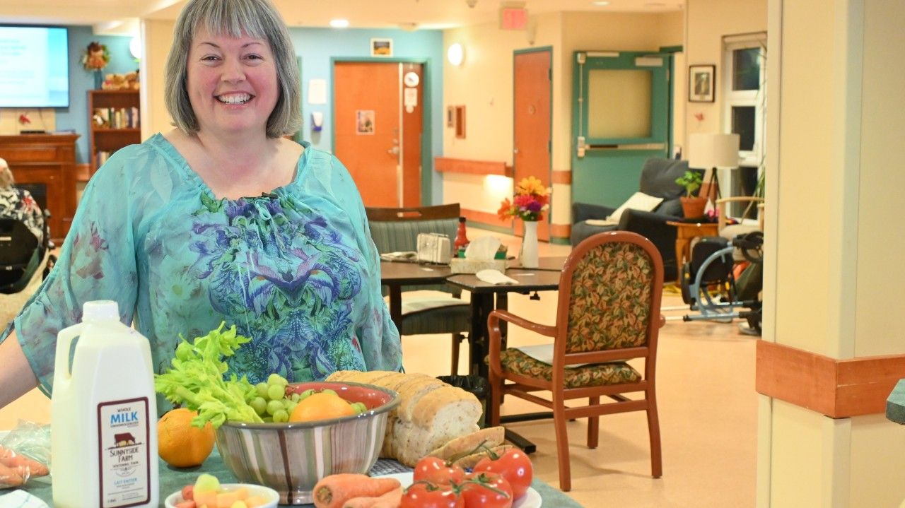 person standing by food