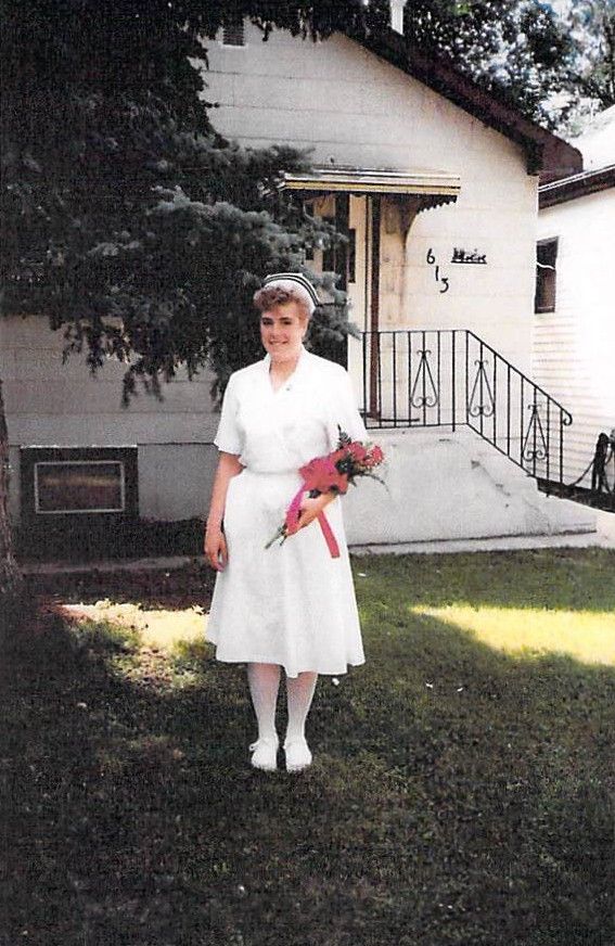 a nurse standing outside