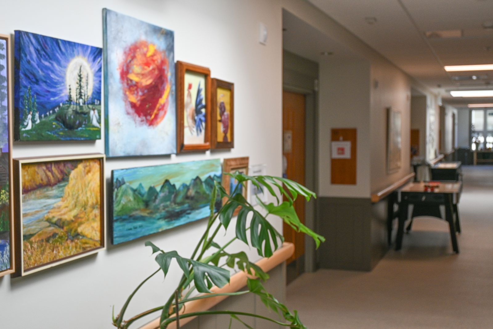 art hanged up on the wall of care home