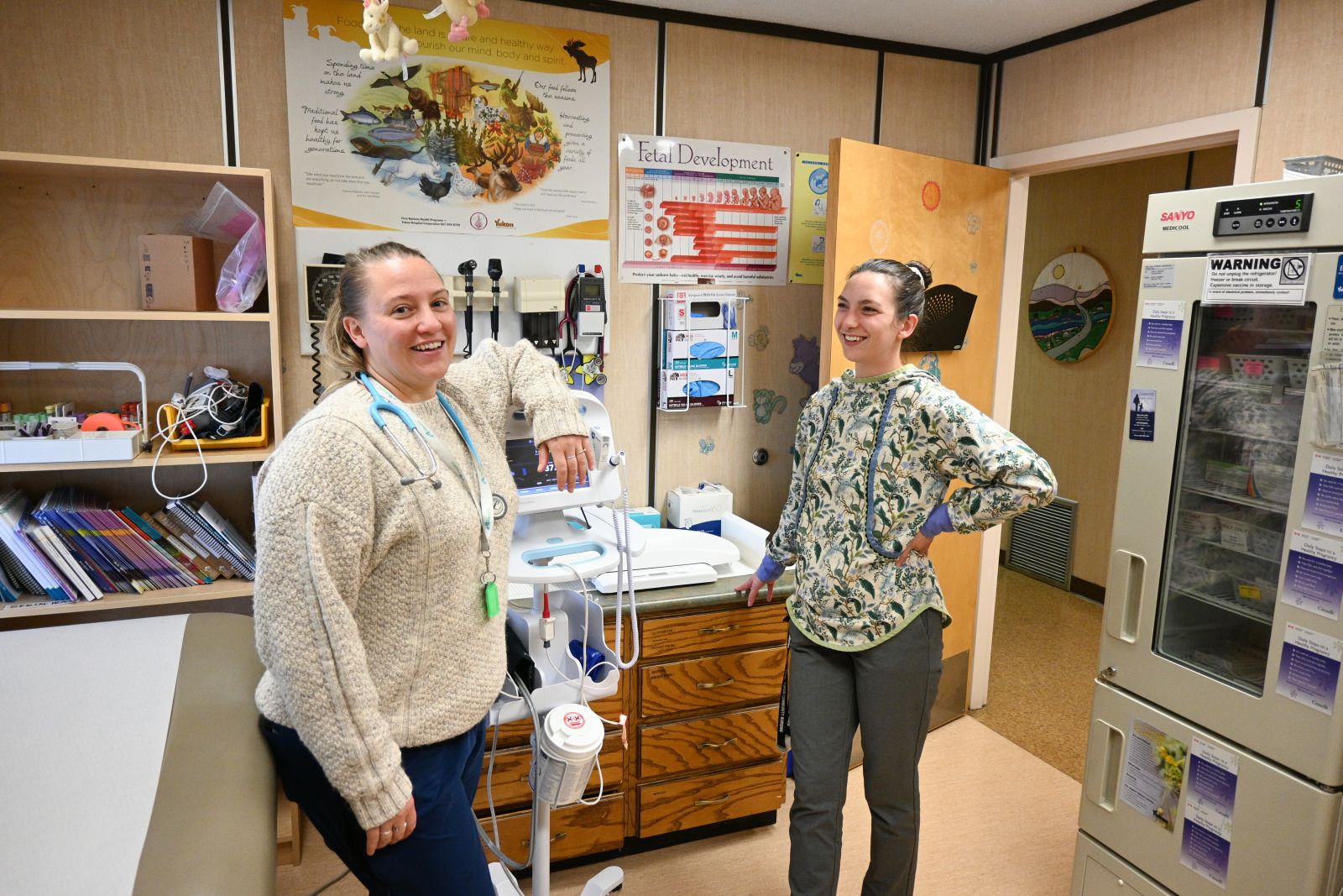 Two nurses are seen working at the Carmacks Health Centre