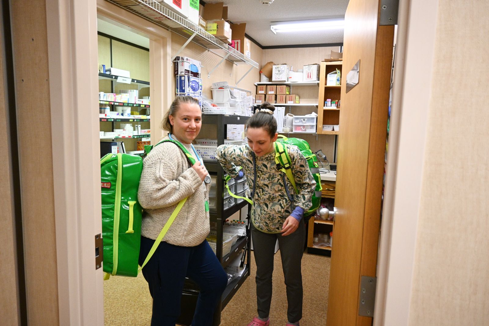 Nurses in Yukon community health centres sometimes respond to emergencies. Here we nurses testing waterproof backpacks they can carry to hard-to-reach areas such as trails.