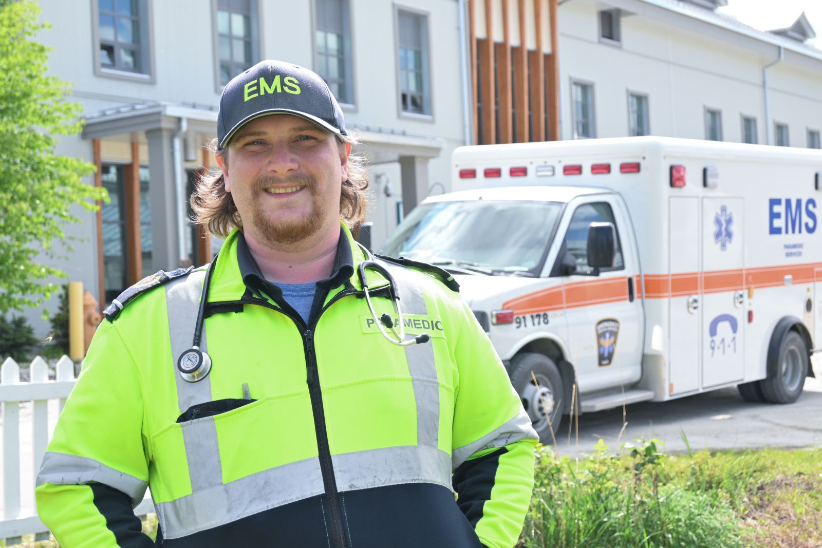 A paramedic is shown outside Dawson City Community Hospital