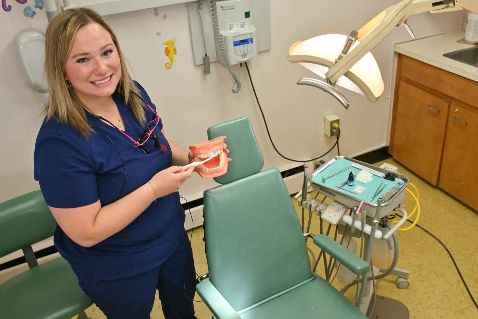 A dental hygienist with the Yukon Children's Dental Program is shown in Whitehorse