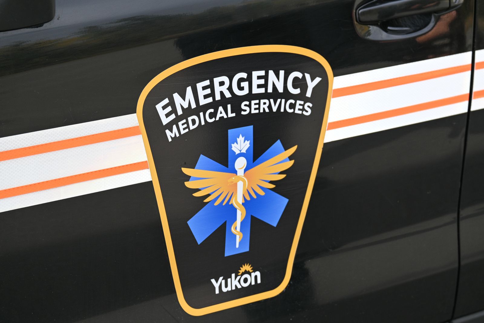 The logo of Yukon Emergency Medical Services