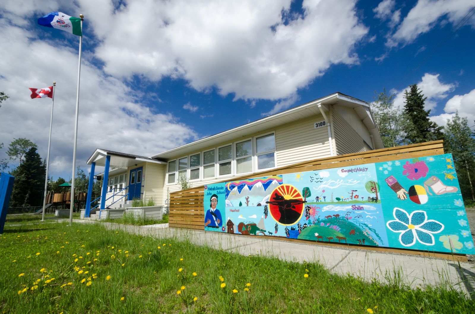 A mural outside of Nelnah Bessie John school in Beaver Creek.  The school was named after the late Nelnah Bessie John, a respected White River elder and language teacher..