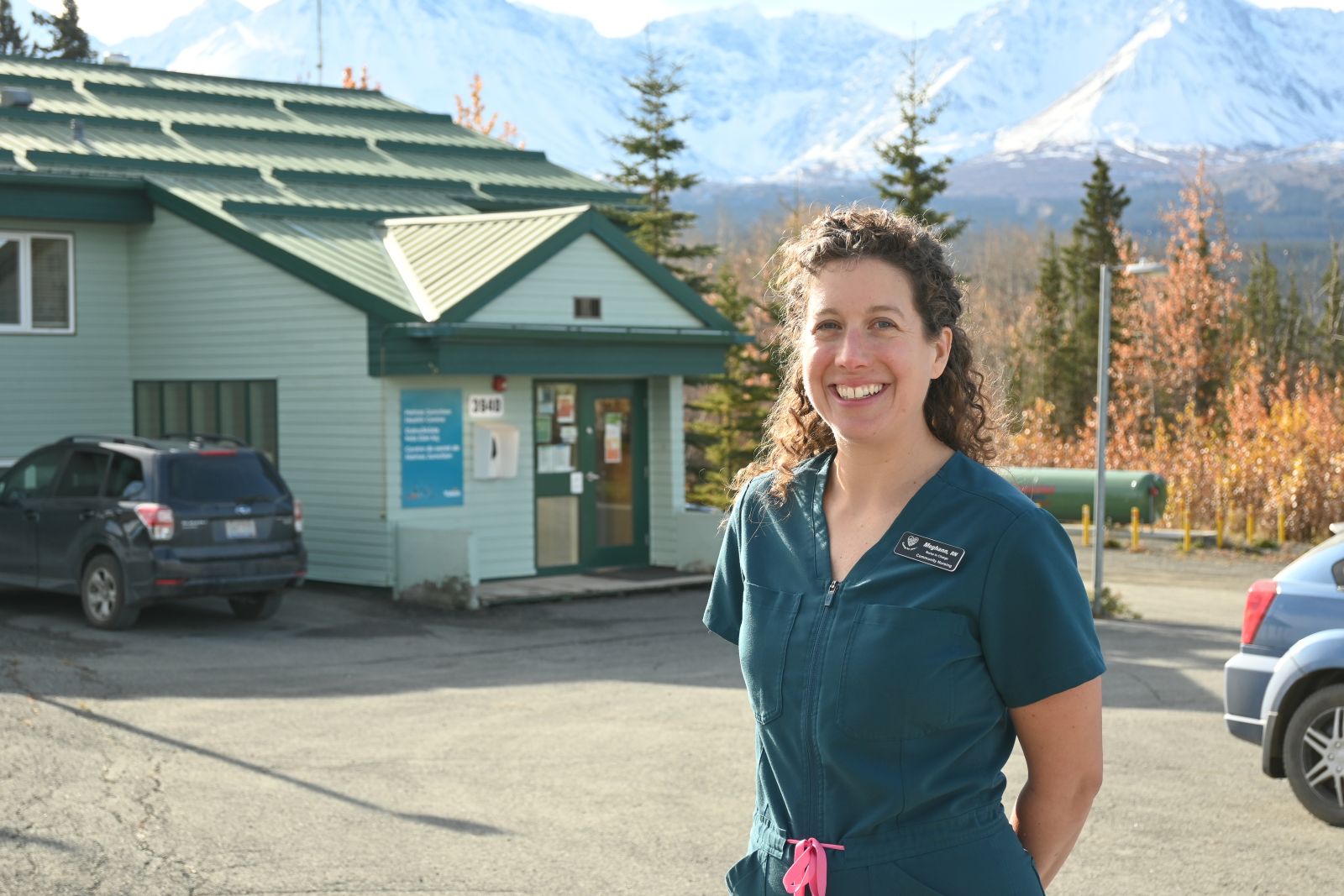 A primary health care nurse stands outside the Haines Junction Health Centre