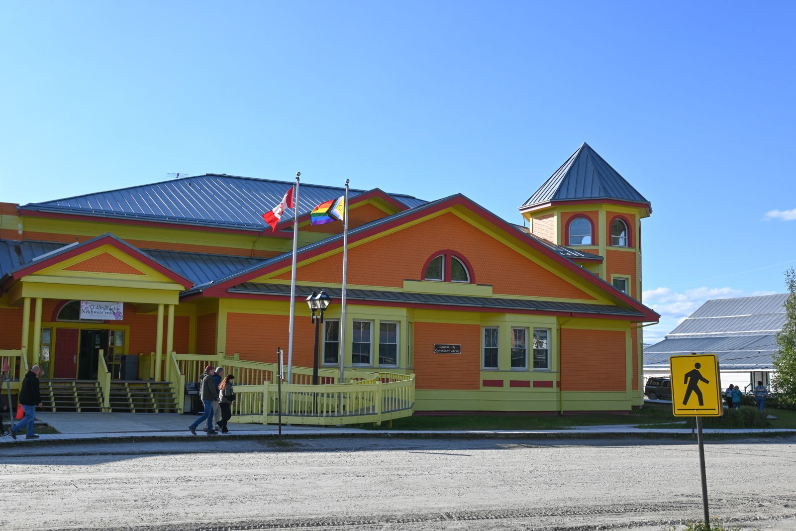 The brightly-painted Robert Service School - Hätrʼunohtän zho - offers grades K-12 in Dawson City.