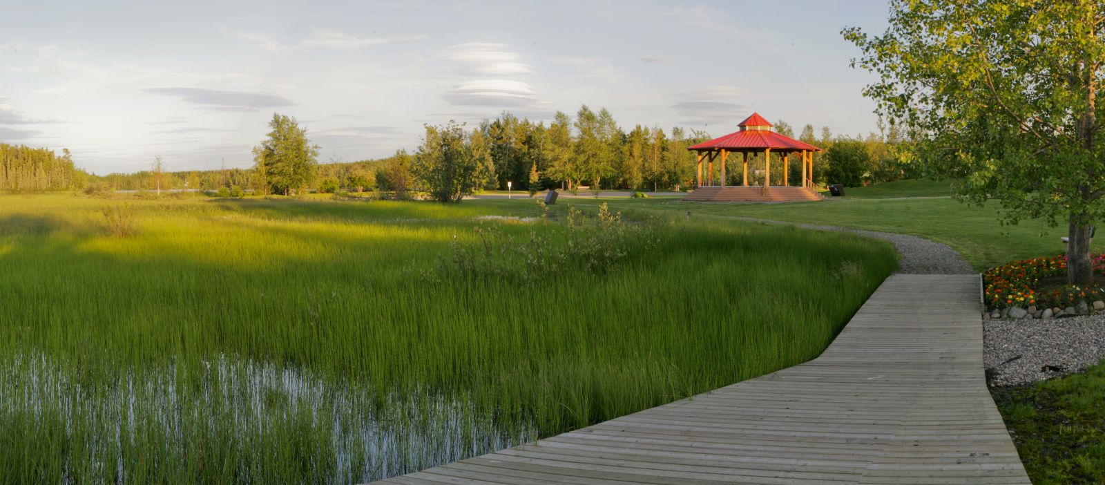 A boardwalk and gazebo are seen on the walking trails near Wye Lake in Watson Lake.