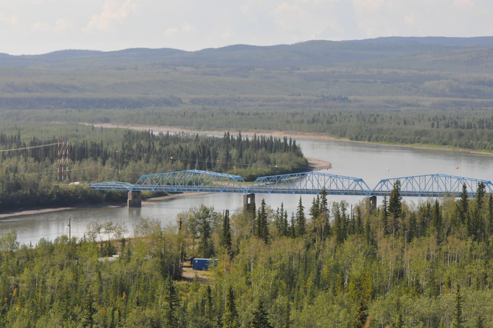 A scenic view in Pelly Crossing cantilever bridge, which crosses the Pelly River.