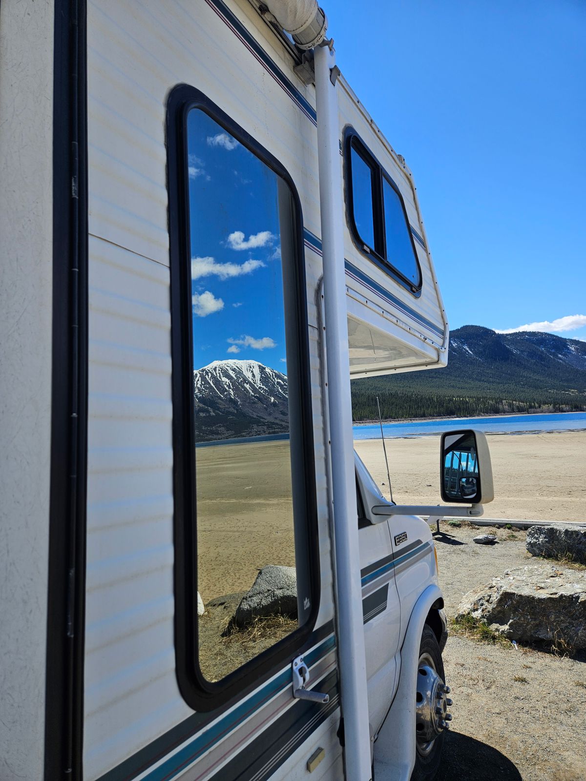 A nice scene from a road trip: An RV stops in view of a Yukon beach. 