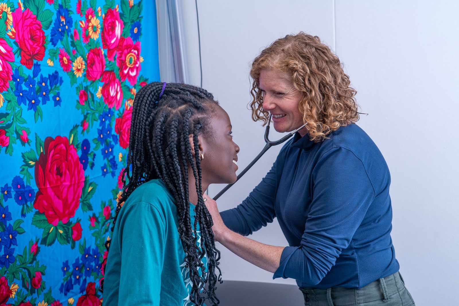 A nurse at the Youth Outreach Clinic is shown attending to a young person