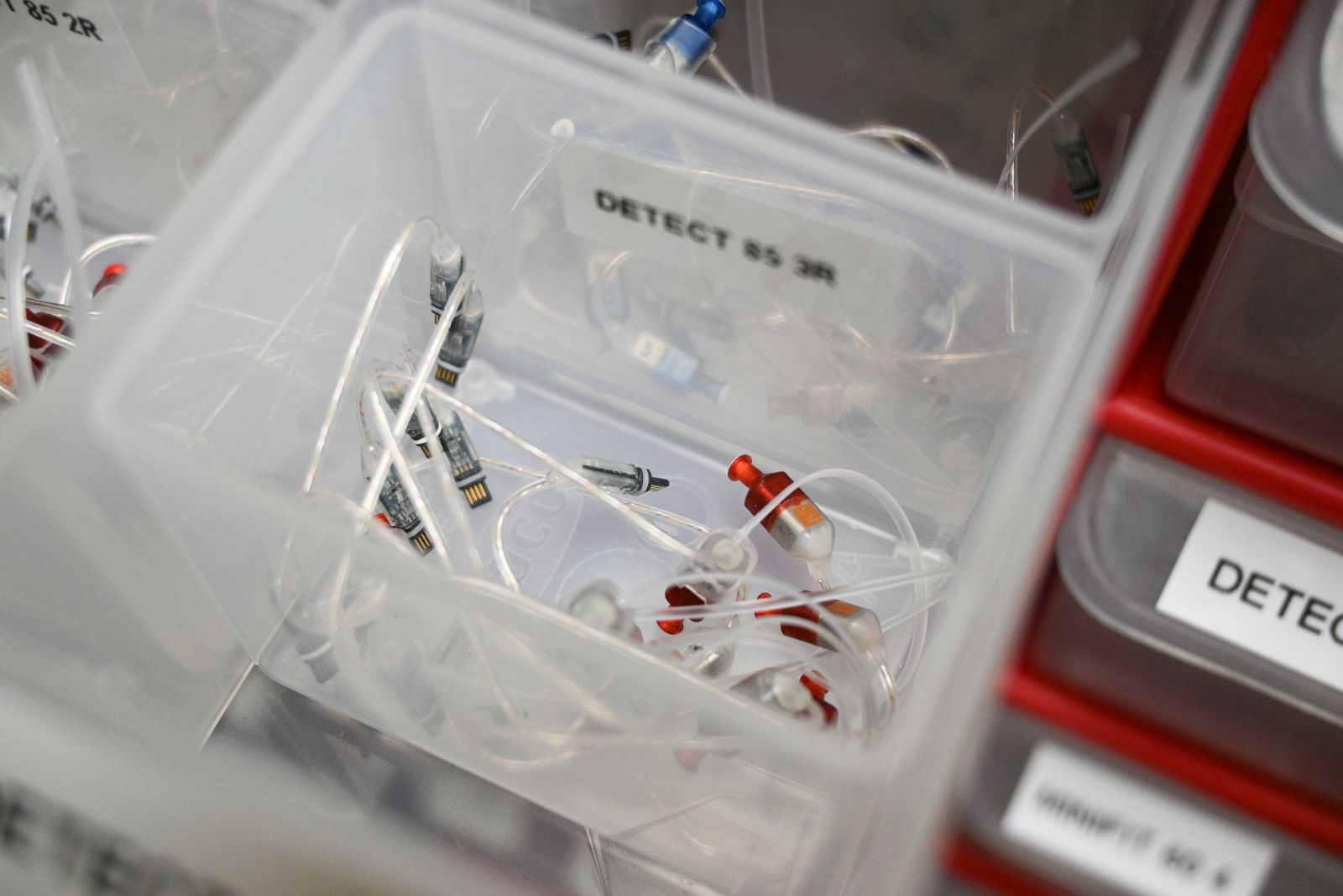 Spare parts for hearing aids are seen in the Hearing Services workshop