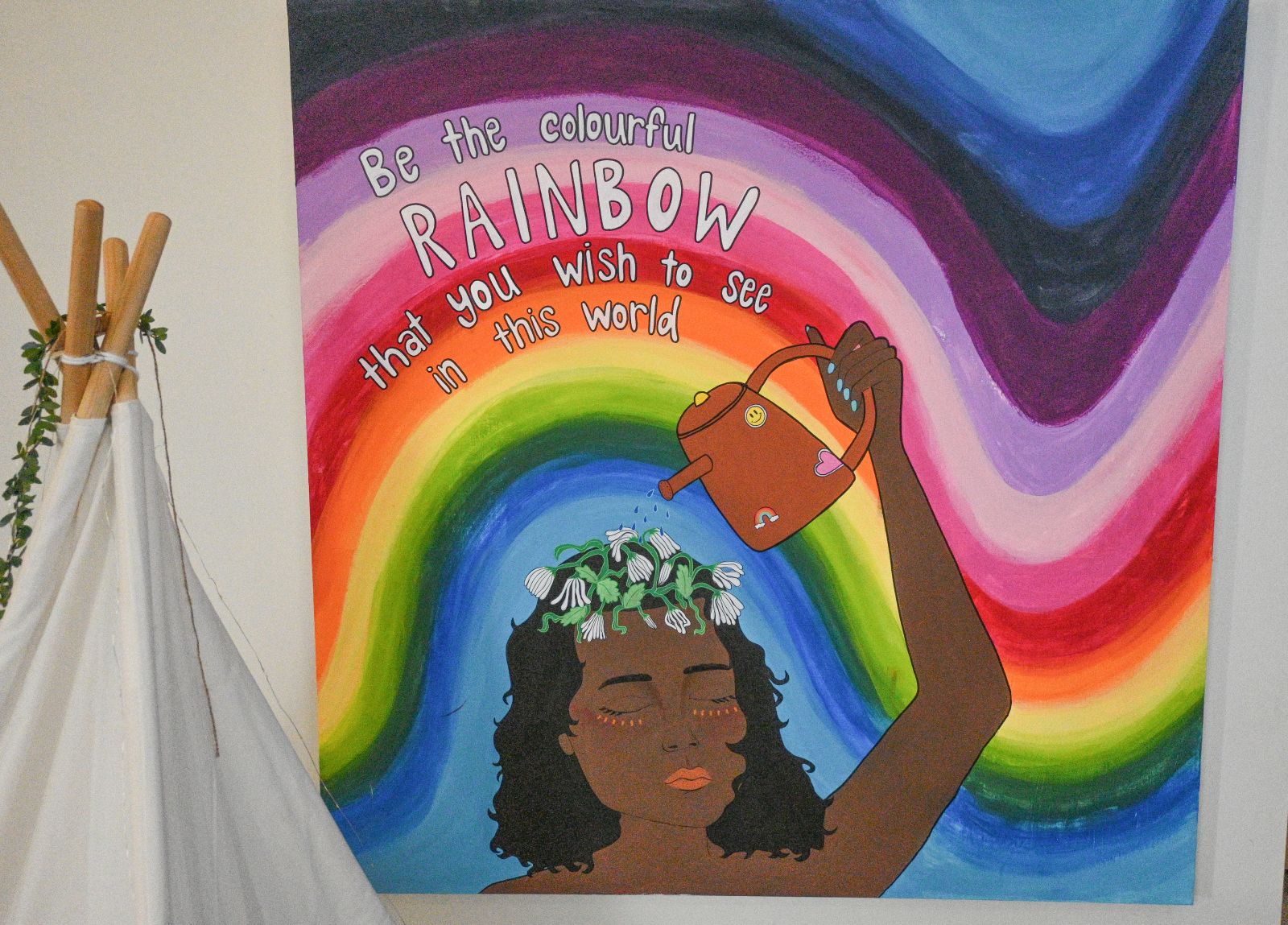 "Be the colourful rainbow you wish to see in this world," encourages artwork at the Youth Outreach Clinic