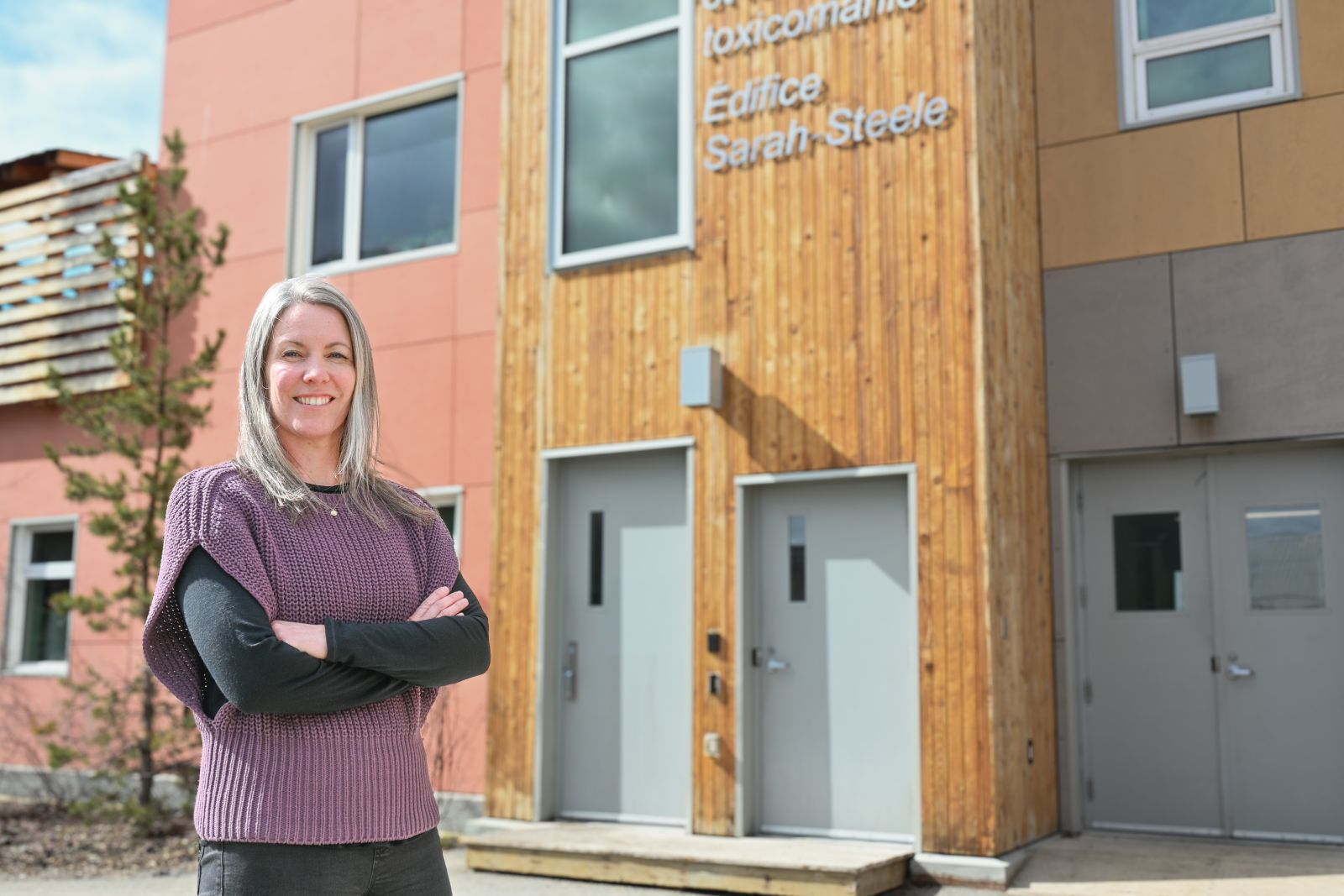 A nurse is shown outside the Sarah Steele building in the Yukon