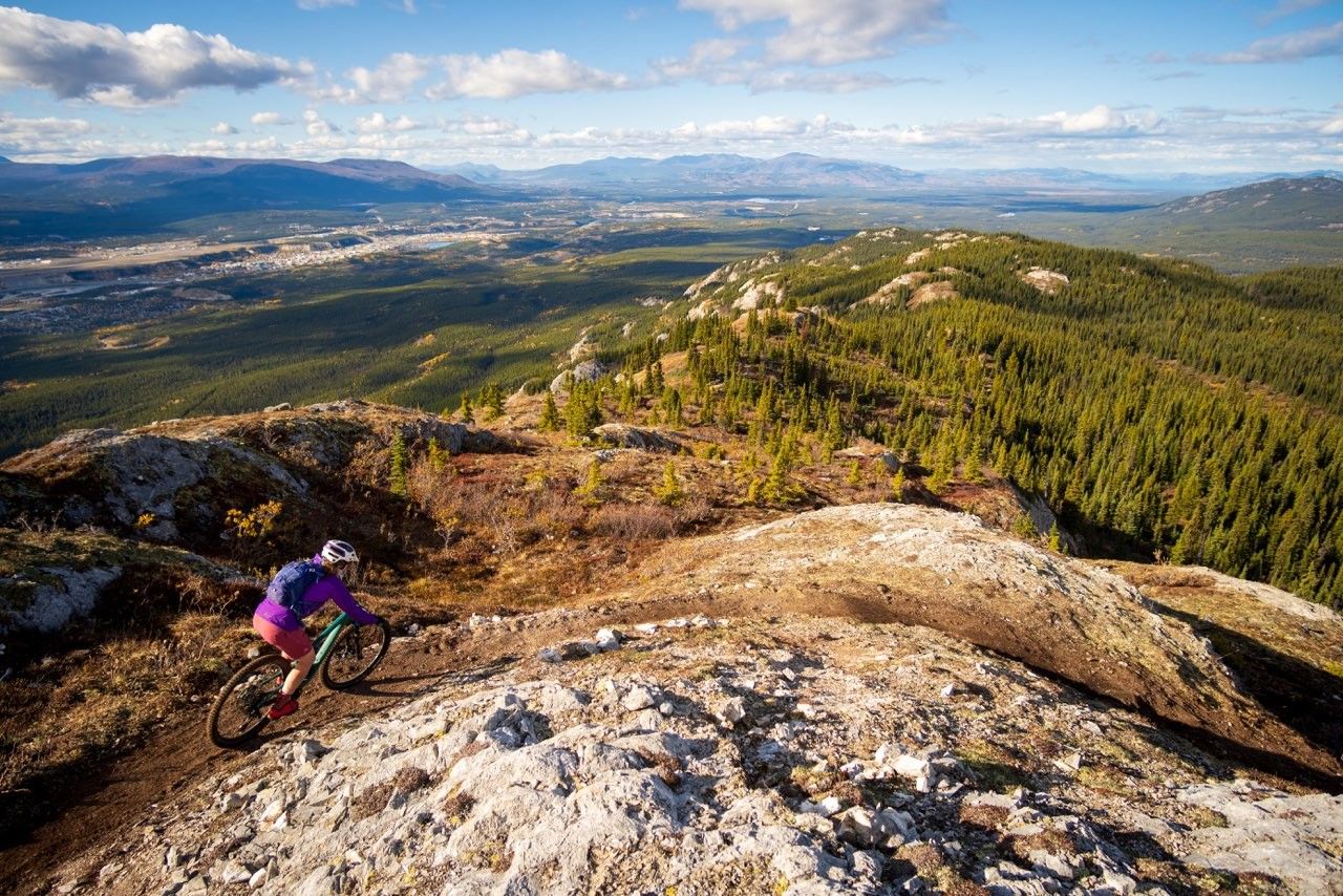 Yukon scenery shows someone hiking