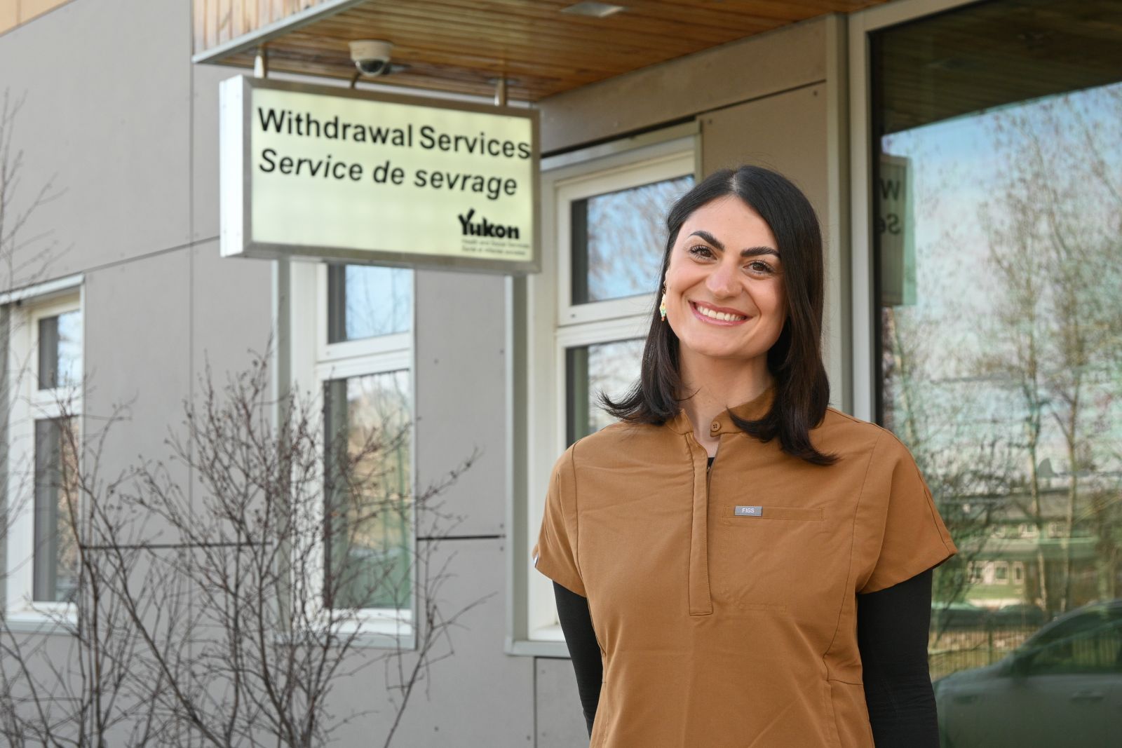 a licensed practical nurse is shown outside the Sarah Steele Building in Whitehorse