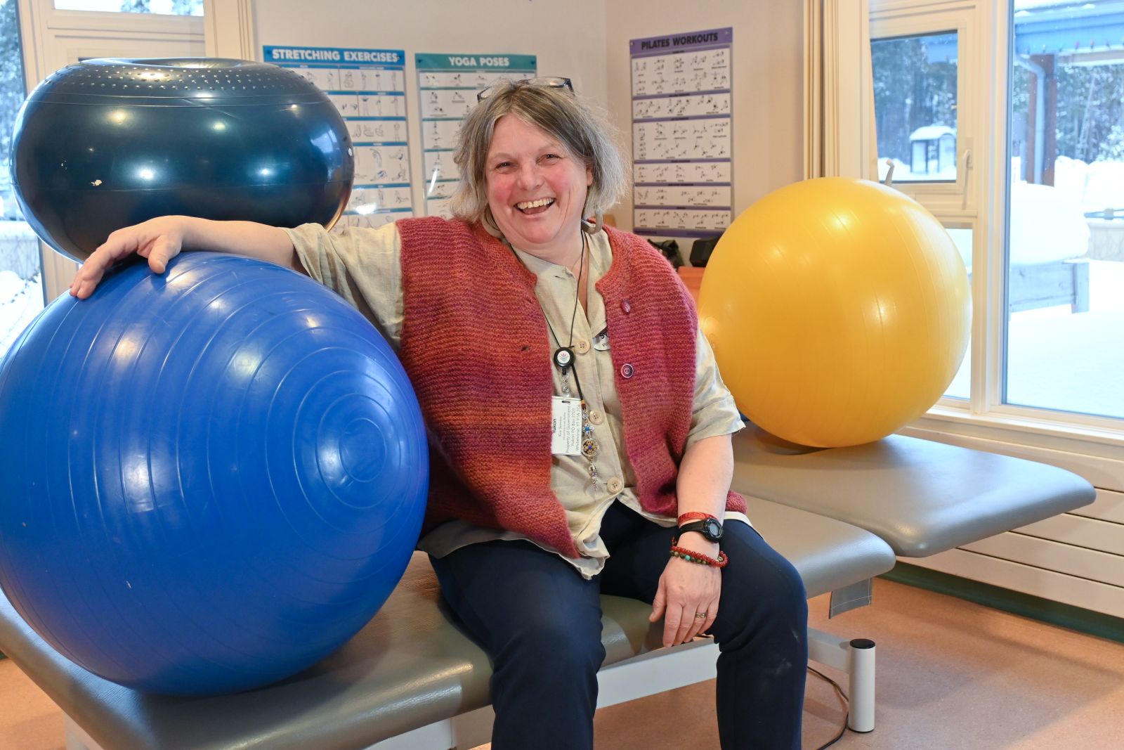woman with therapy balls and therapy table