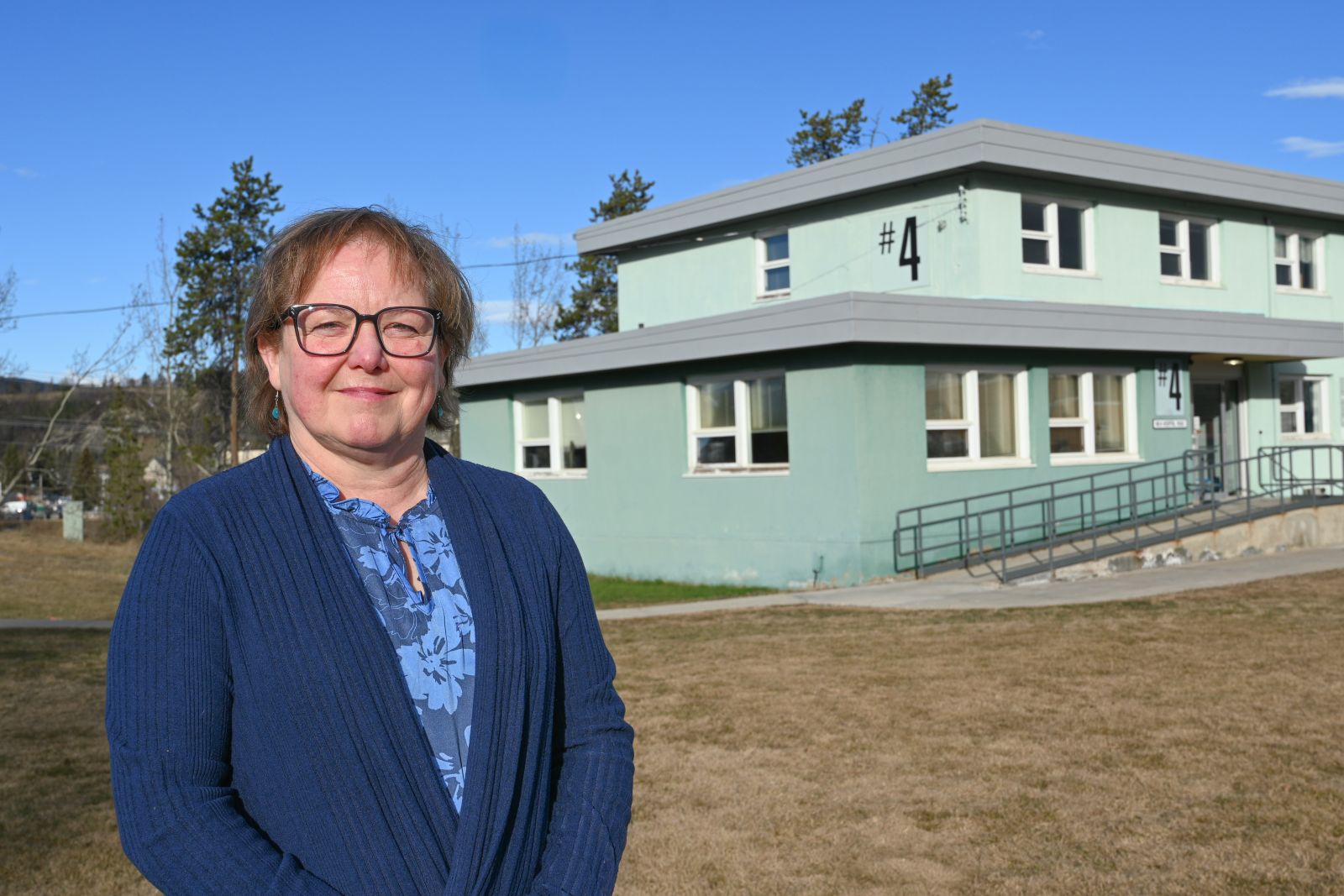 A portrait of a manager in front of Yukon Communicable Disease Control