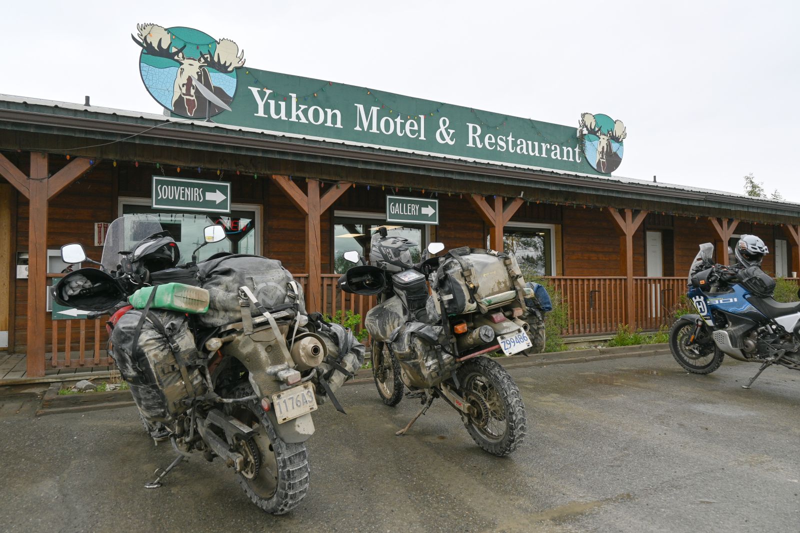 Motorcycles are parked outside the Yukon Motel & Restaurant in Teslin.