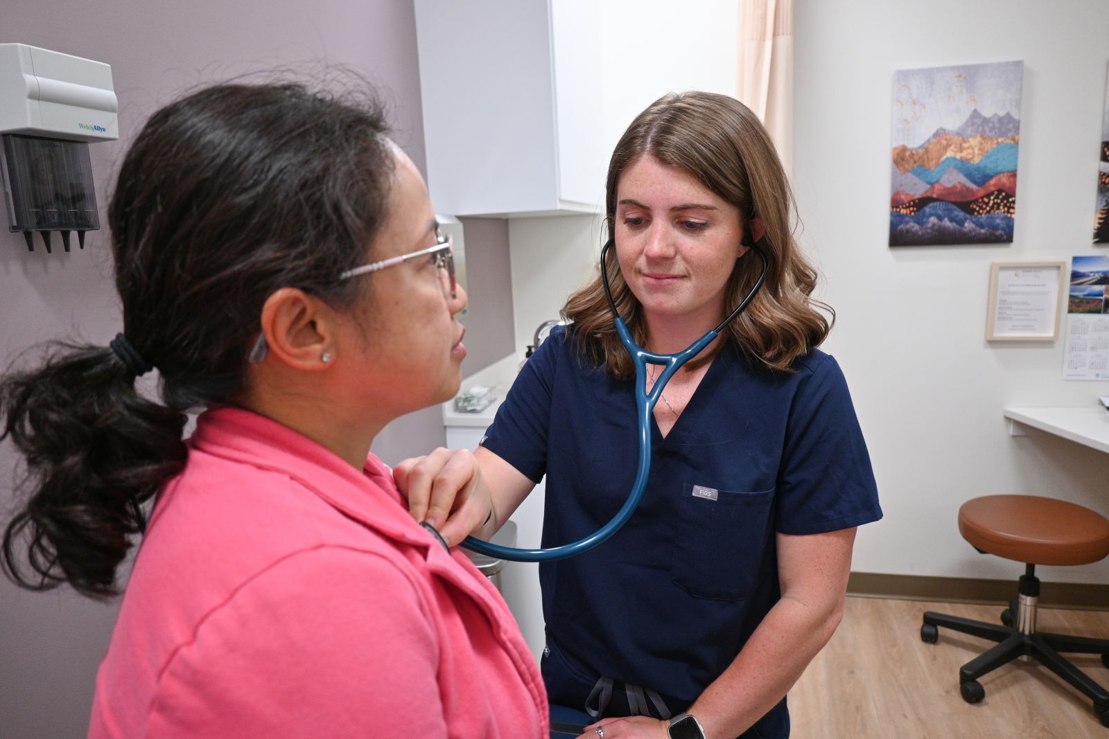 a doctor examines a patient in Whitehorse, Yukon
