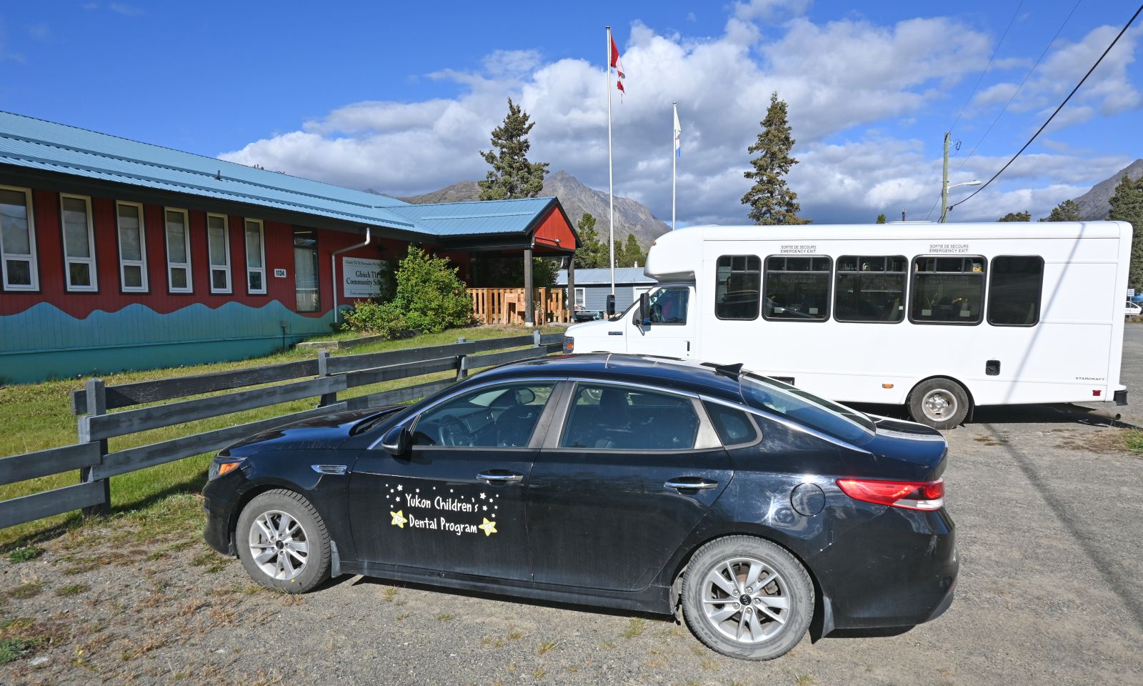 A Yukon Children's Dental Program vehicle outside Ghùch Tlâ Community School in Carcross