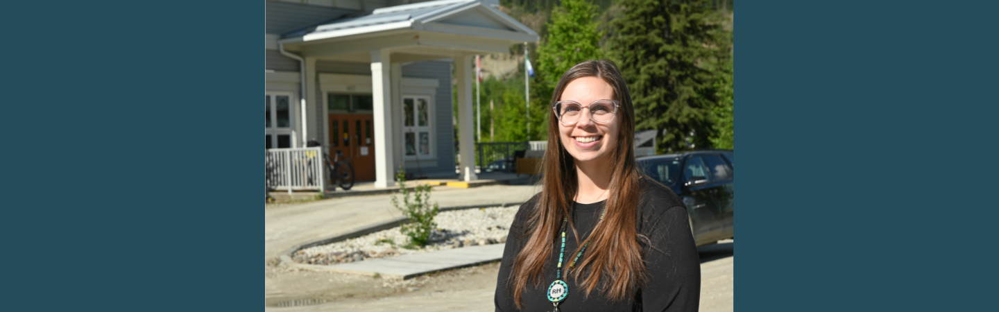 A registered nurse is seen outside Alexander McDonald Lodge in Dawson City