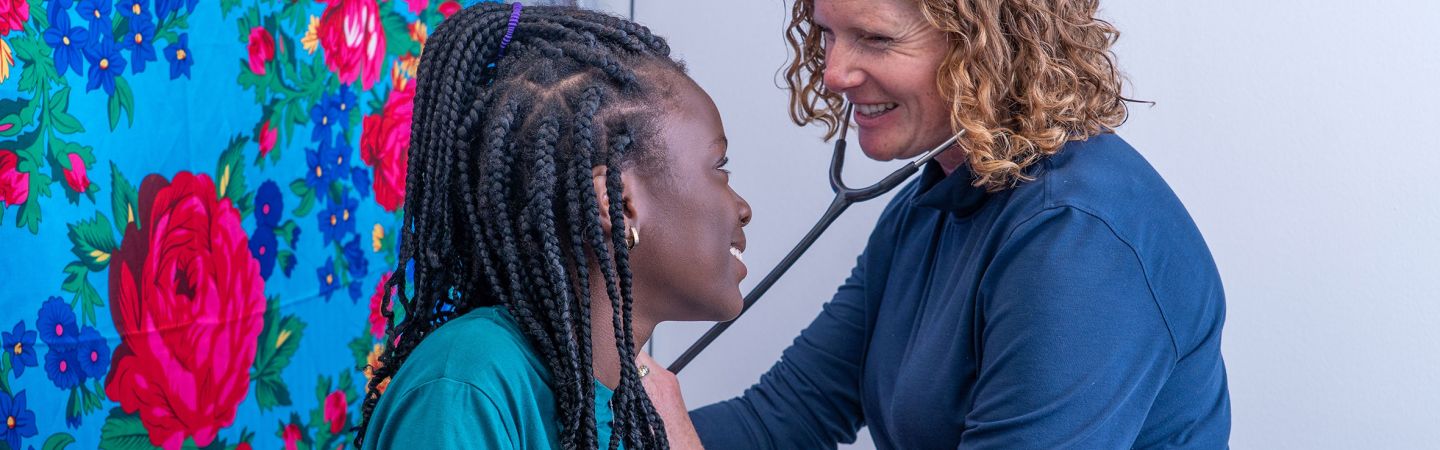 A nurse at the Youth Outreach Clinic is shown attending to a young person