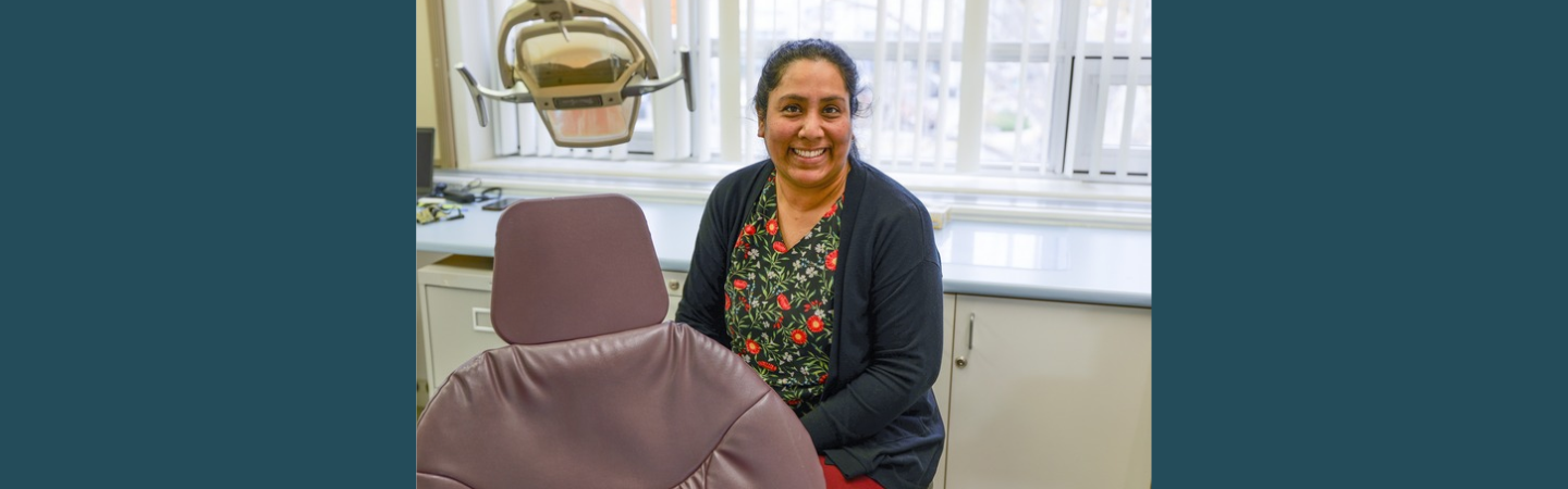 A dental hygienist is shown at her workplace in Whitehorse